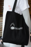 tote "let me light your fire"